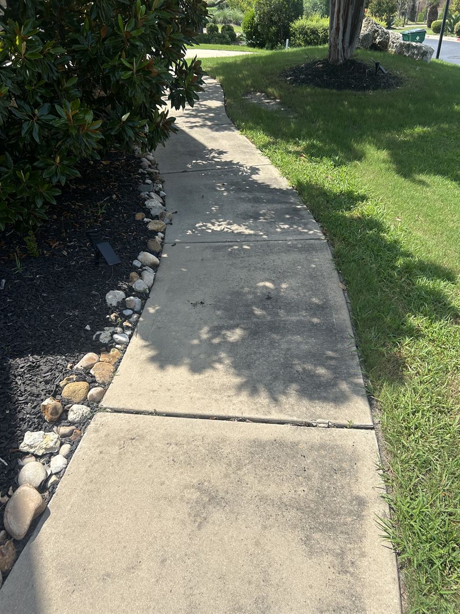 The same walkway cleaned evenly end to end
